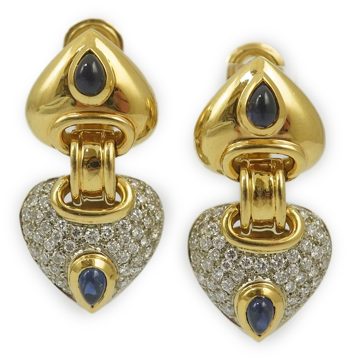 A modern pair of Mappin & Webb 18ct gold, cabochon sapphire and diamond cluster set stylised heart shaped drop earrings